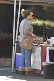 th_13929_Preppie_Hilary_Duff_shops_for_toys_before_grabbing_some_freshly_prepared_coconut_6_122_159lo.jpg