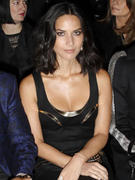 th_844218329_olivia_munn_cleavy_dress_at_paris_fashion_week_01_122_200lo.jpg